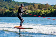 A woman looking comfortable ridding a foil