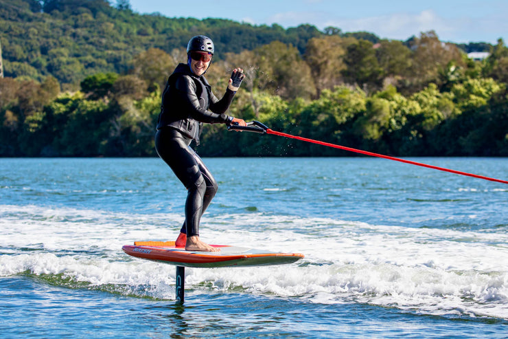 A woman looking comfortable ridding a foil