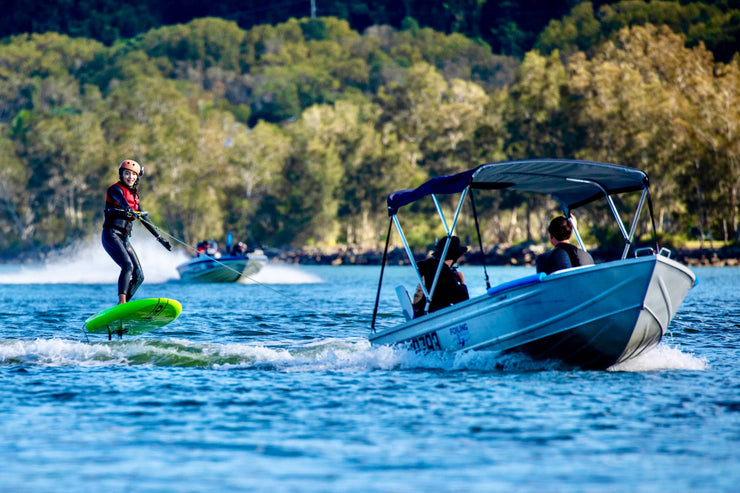 Foil lesson behind a boat